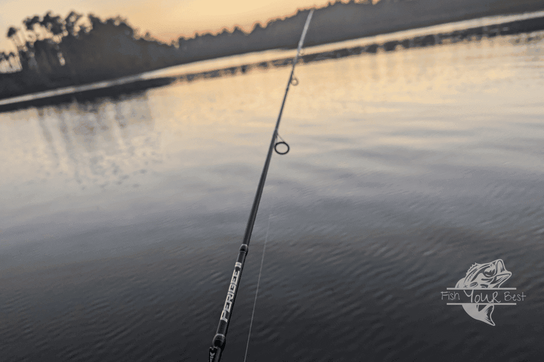 Ultra light crappie rod with local lake in background.